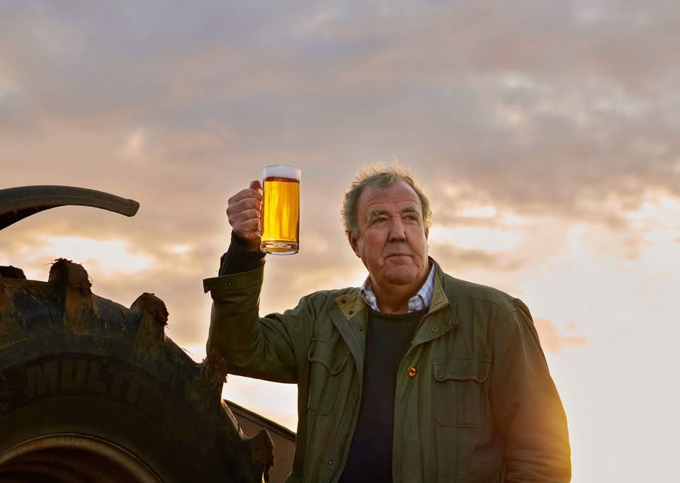 Jeremy Clarkson holding a beer