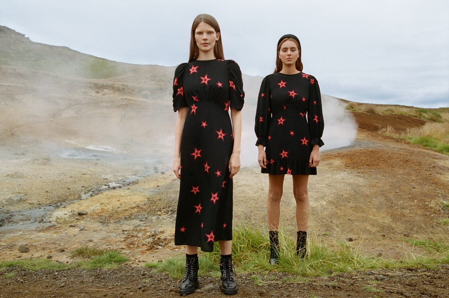 Nobody's Child models standing in a misty field wearing matching dresses