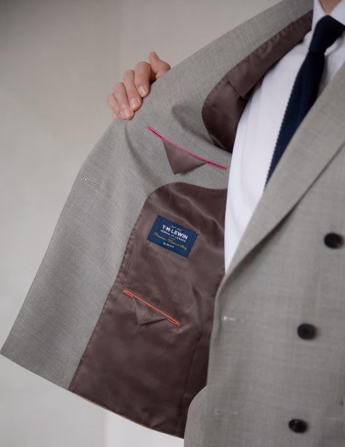 T.M.Lewin model showing the inside of a suit